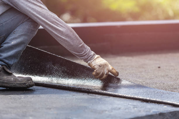 Professional Exterior Waterproofing technician working in Lincoln, AL
